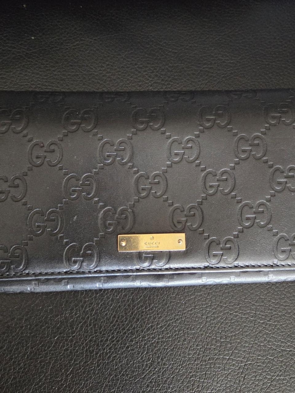 Gucci W/ COA Black Embossed GG Leather Wallet with Gold Plaque